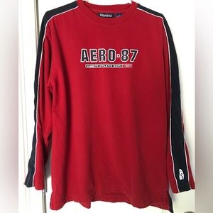 Aeropostale long sleeve deep red with blue and white accents. Medium. Excellent